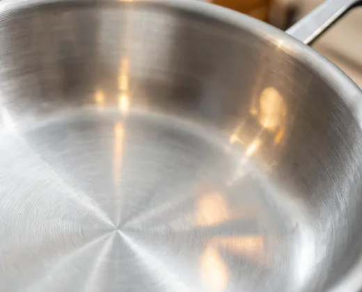 Brushed stainless cookware finish